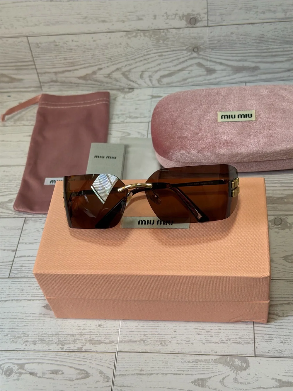 Miu Miu Brown Oversized Shield Sunglasses with Gold Accents